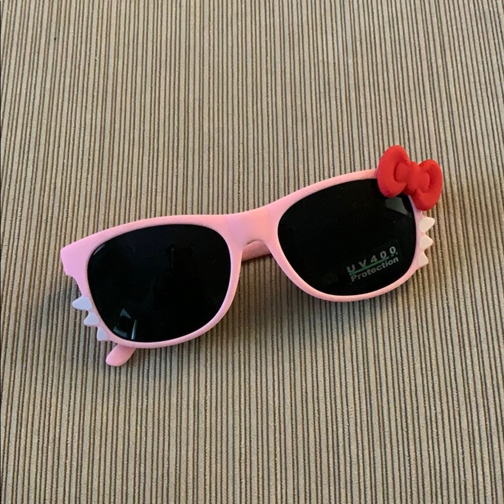 Hello Kitty UV 400 protection sunglasses. NWT
